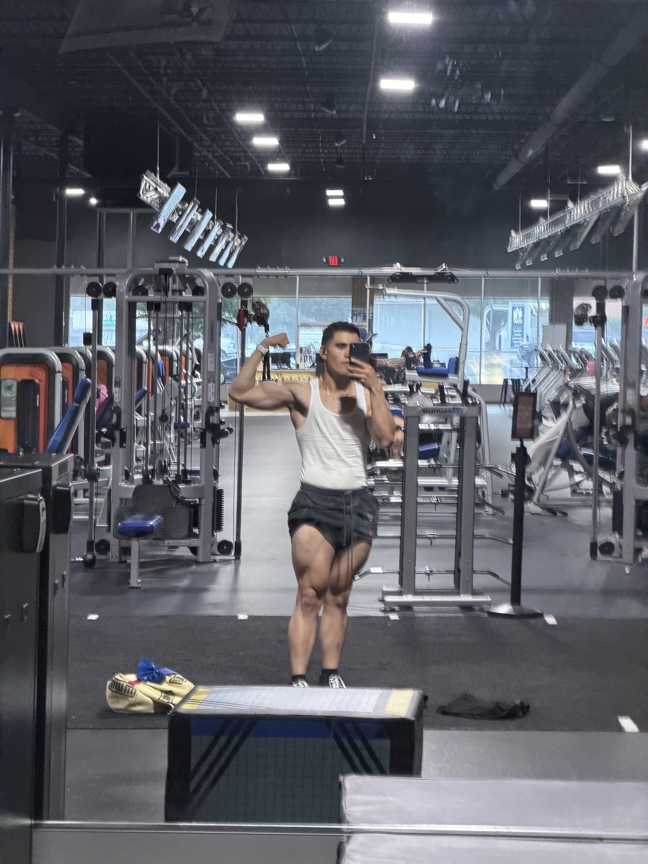 Rito Garcia bicep flex in the gym