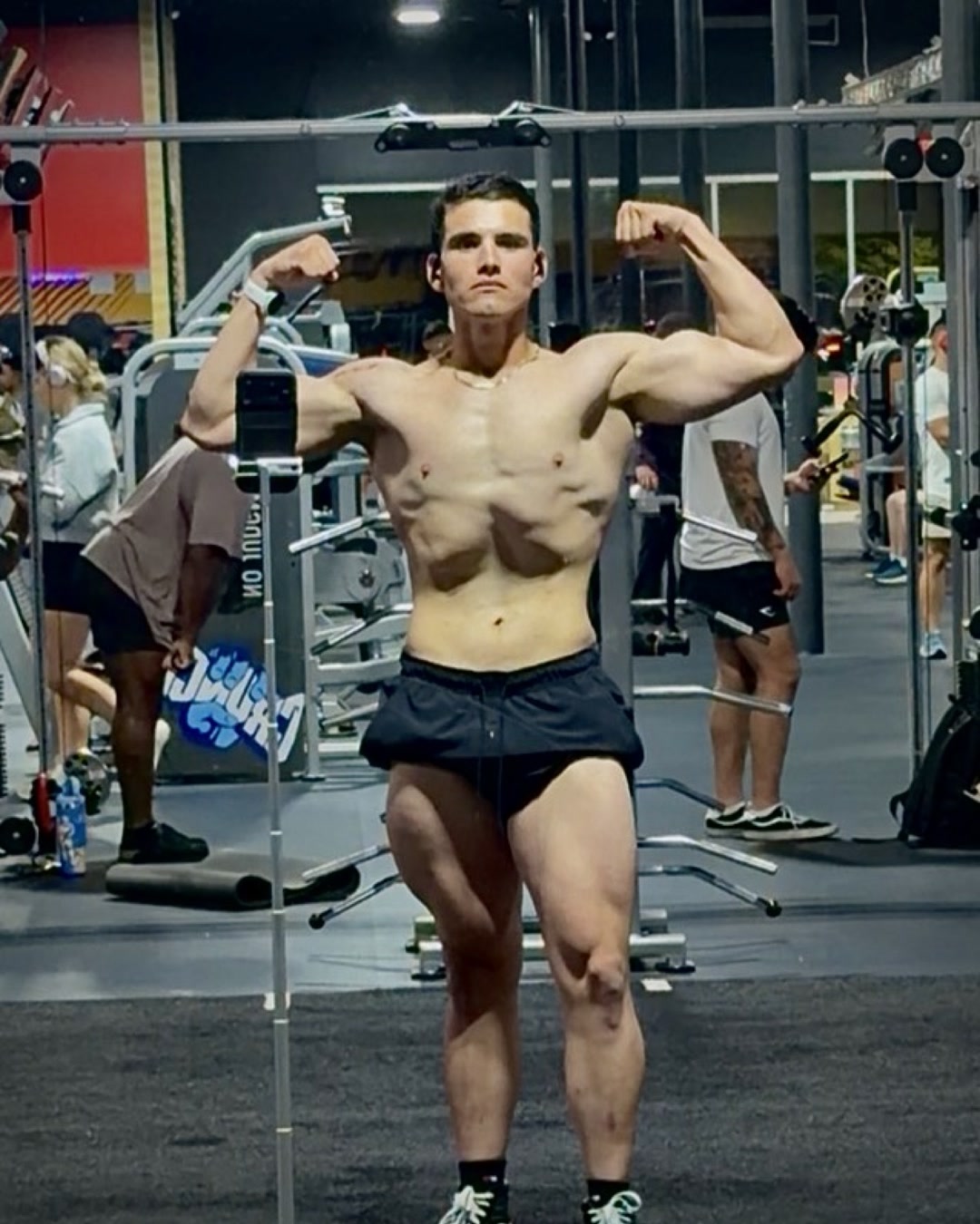 Rito Garcia, lifetime natural coach, front double bicep pose